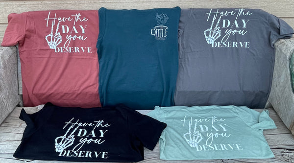 Have the Day You Deserve CattleGrounds Logo Tee
